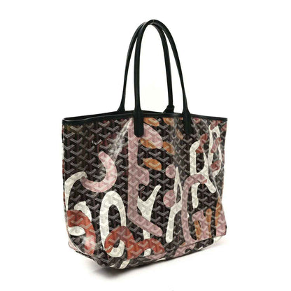PM tote bag with black handles and dark monogram fabric, multicolor letter print on the front