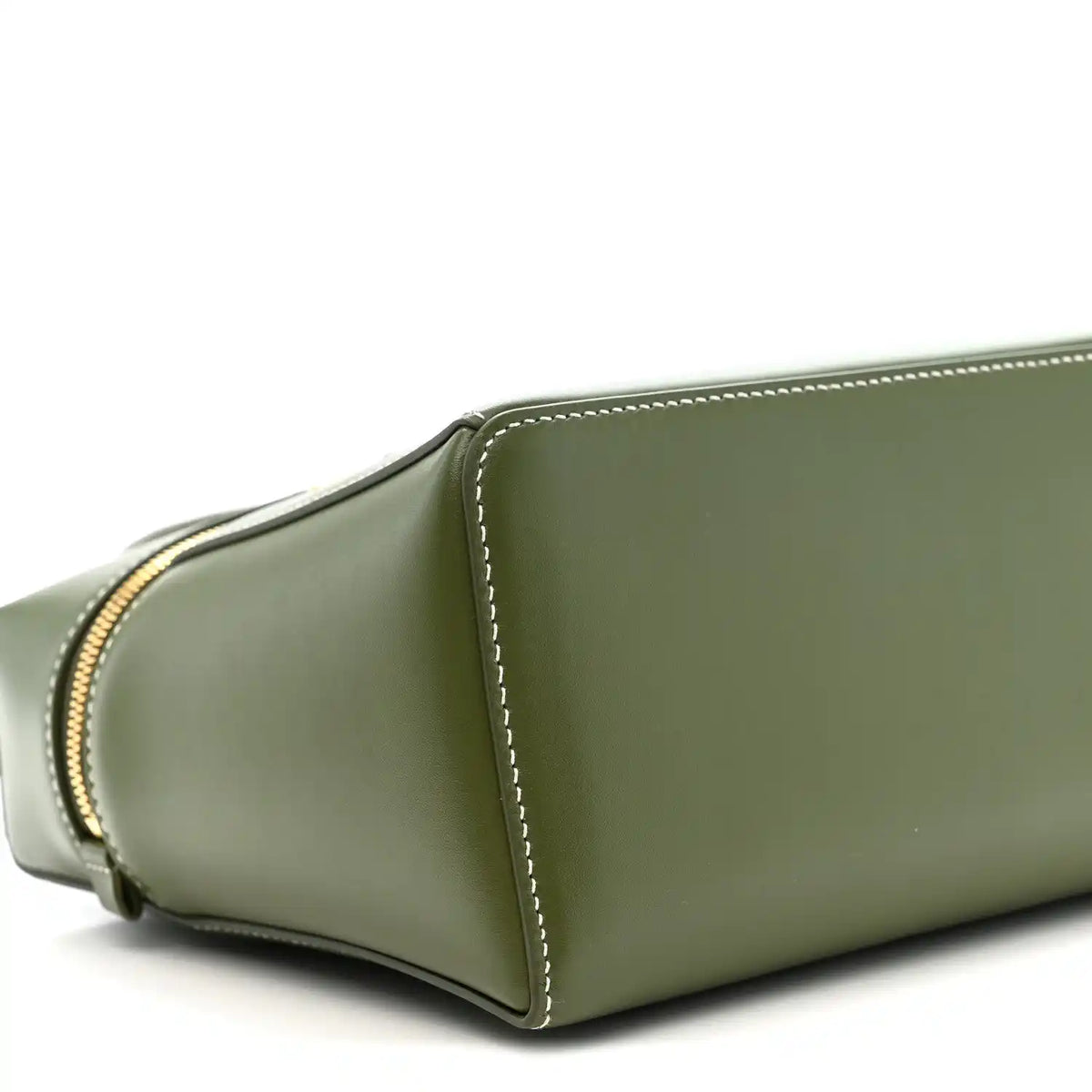 Olive green leather handbag side panel with curved seam and contrast edge stitching