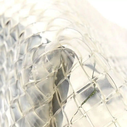 Intrecciato tote bag close-up, light woven PVC and leather panels with lattice pattern