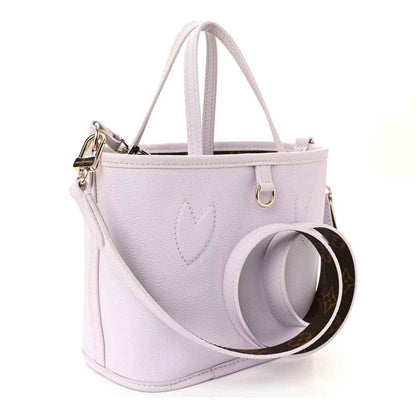 Lilac BB bag with top handles and circular monogram-lined strap insert