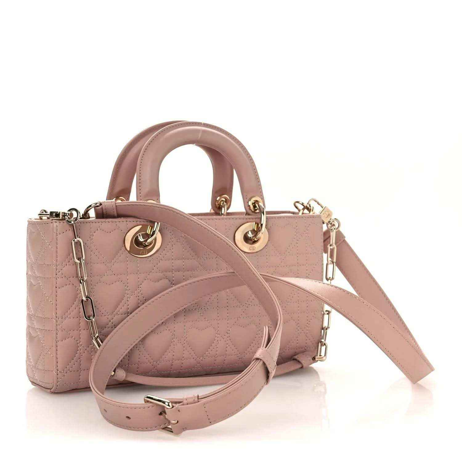 Medium lambskin handbag in pale pink with shoulder strap and gold-tone hardware