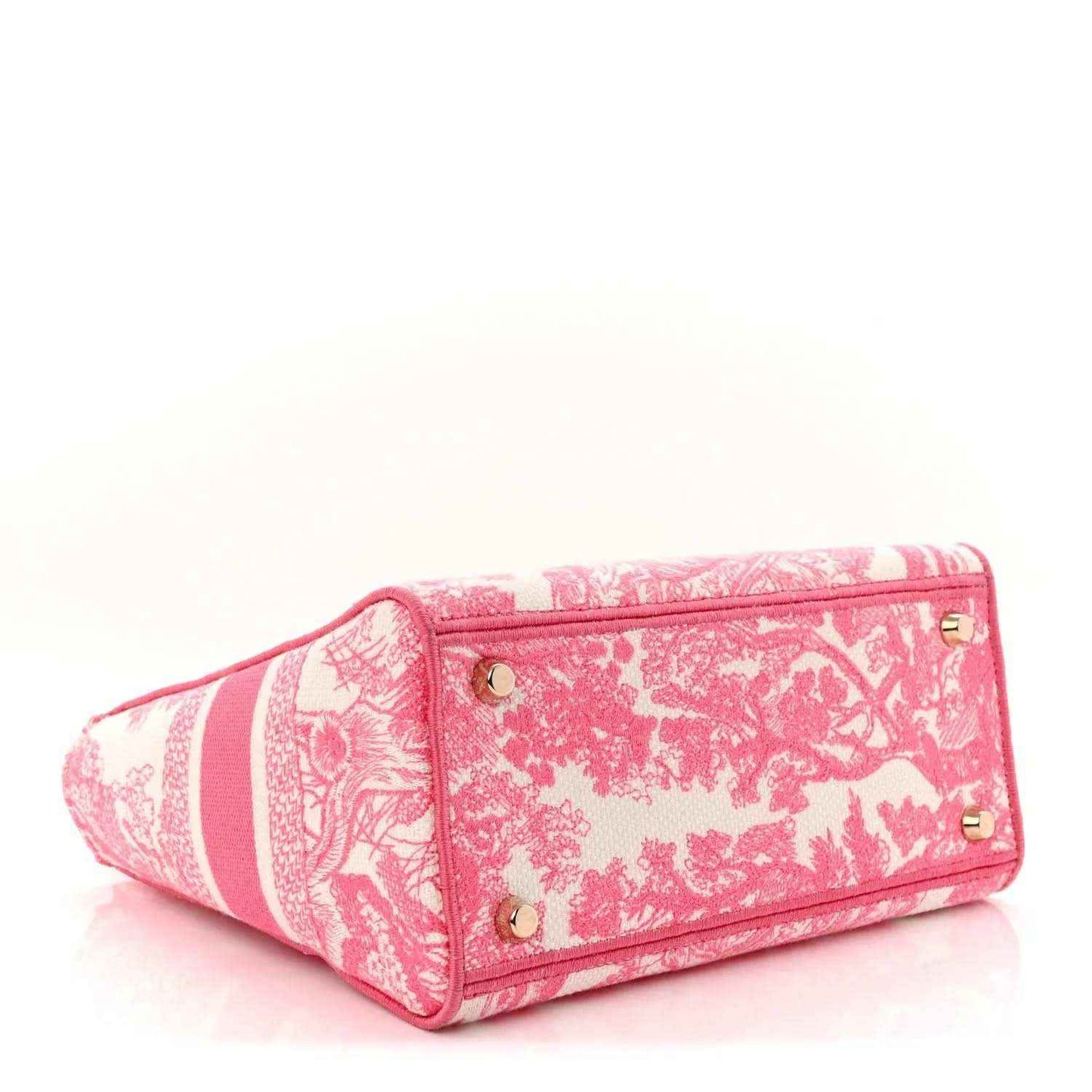 Pink and white patterned tote bag with top handles and side profile, gold hardware