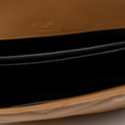 Natural tan leather edge of a bag in close-up