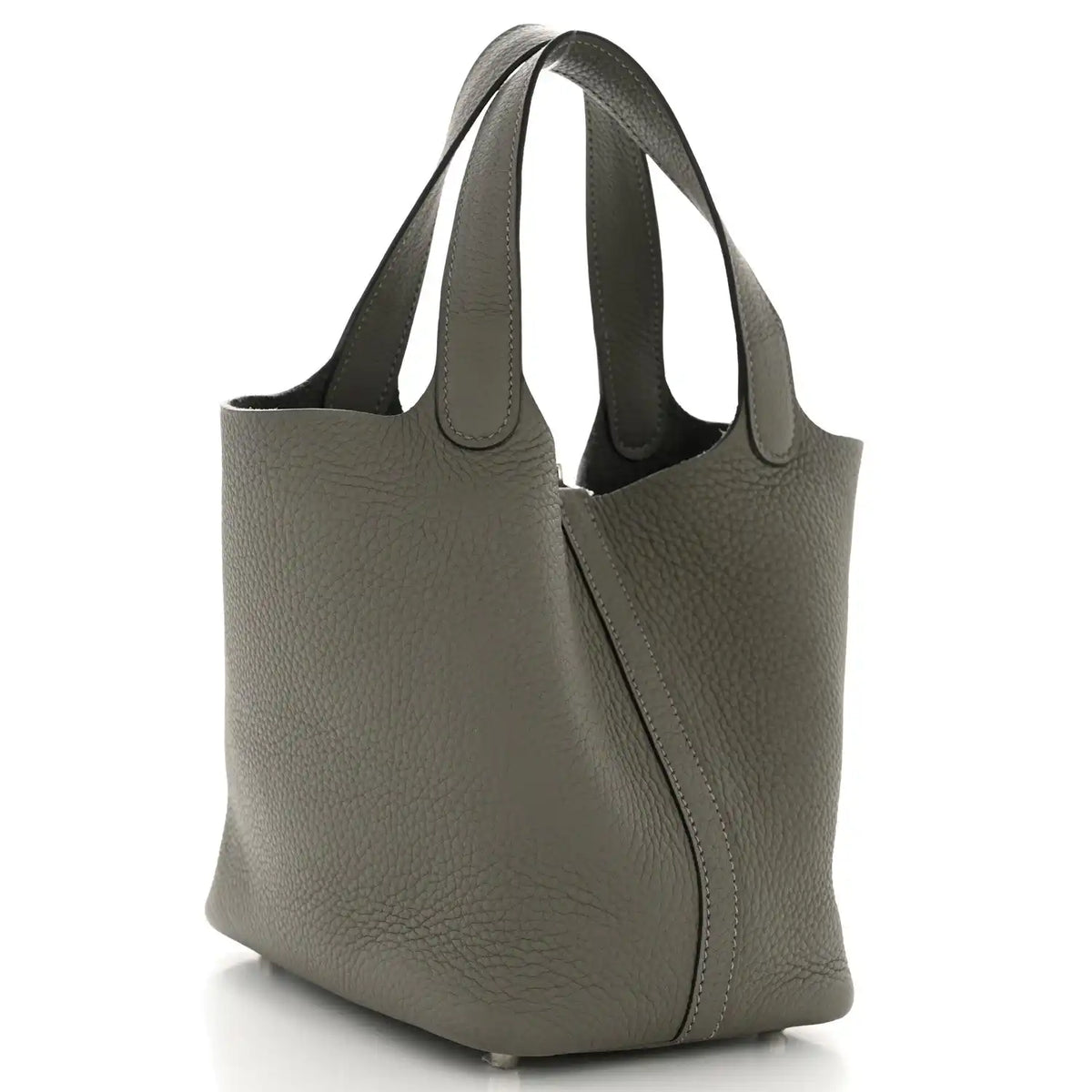 Leather bucket bag side view with curved handles and center zip, dark green