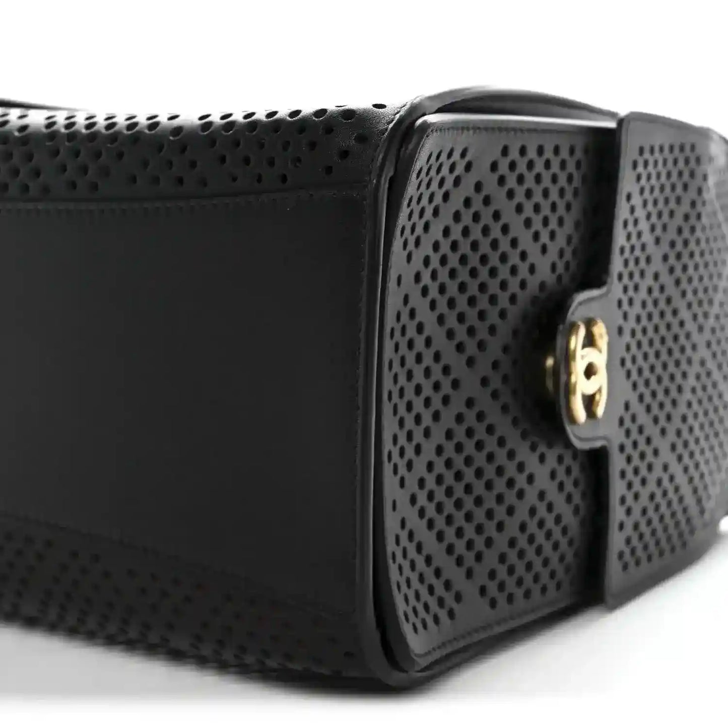Chanel handbag with black perforated calfskin panels and gold clasp hardware