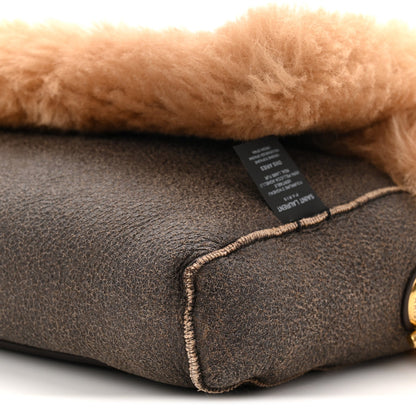 Saint Laurent reversible satchel interior label on dark leather with contrast edge stitching