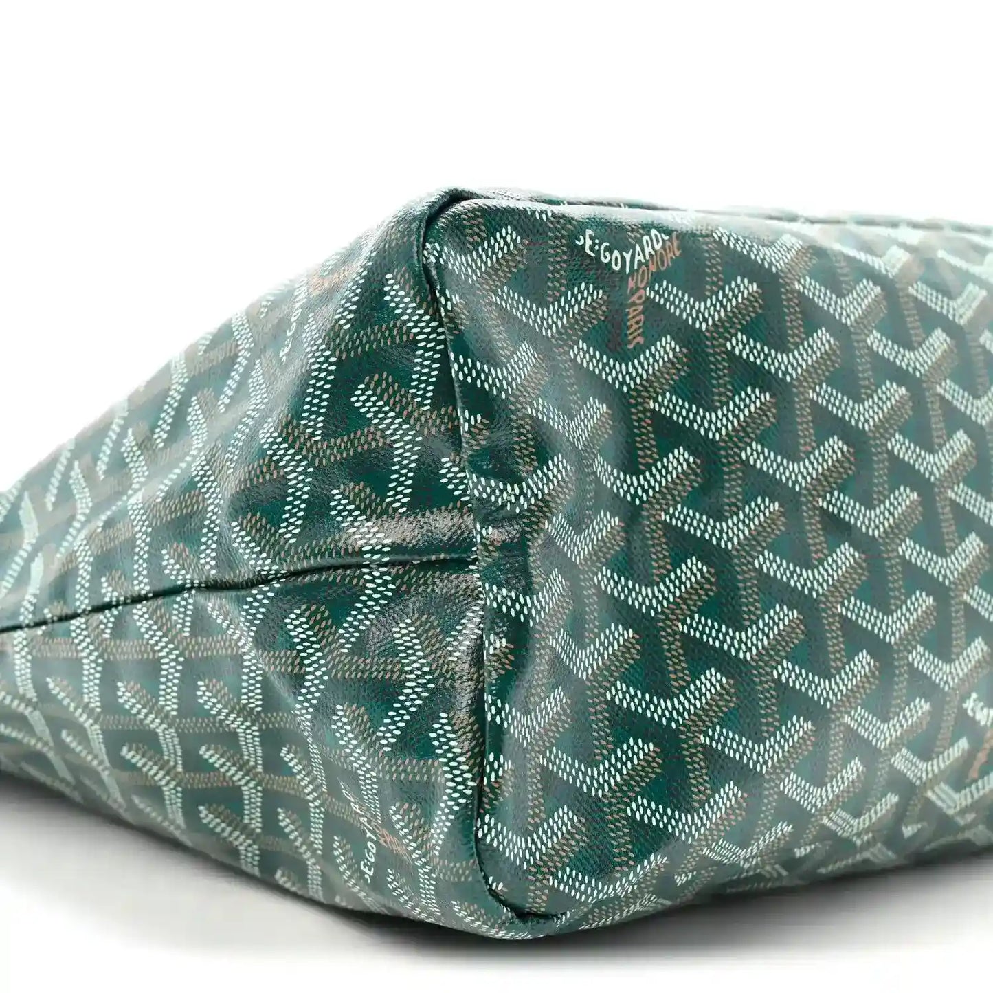 Green chevron-pattern coated canvas bag base with side seam and snap tab