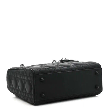 Black quilted handbag base with silver feet and dual top straps