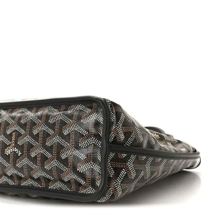 Reversible mini pouch bag side view with black zipper trim and patterned canvas