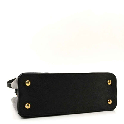 Louis Vuitton Capucines BB bag base in black leather with gold feet and strap loop