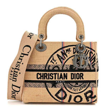 Beige embroidered canvas jute tote bag with top handles and logo print panel