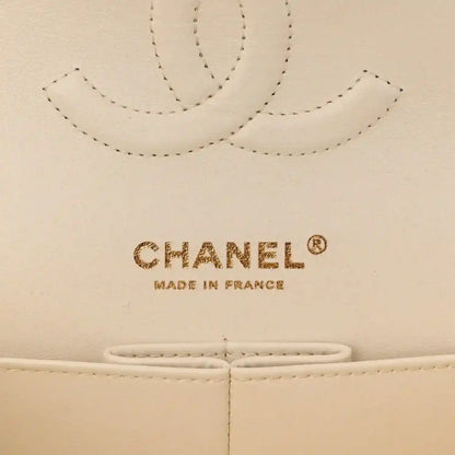 CHANEL white leather double flap bag logo on stitched panel