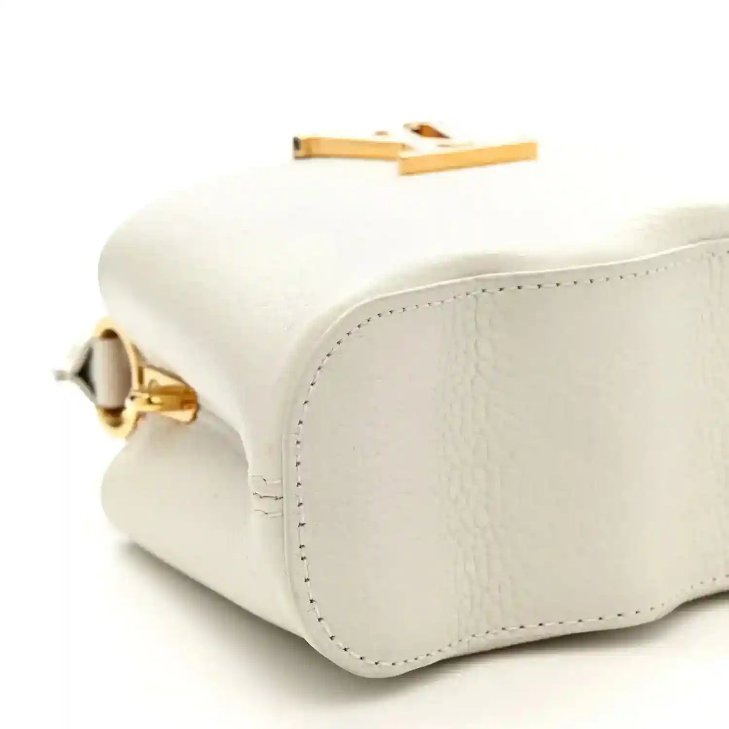 Louis Vuitton Capucines mini handbag, white, bottom corner with gold hinge detail