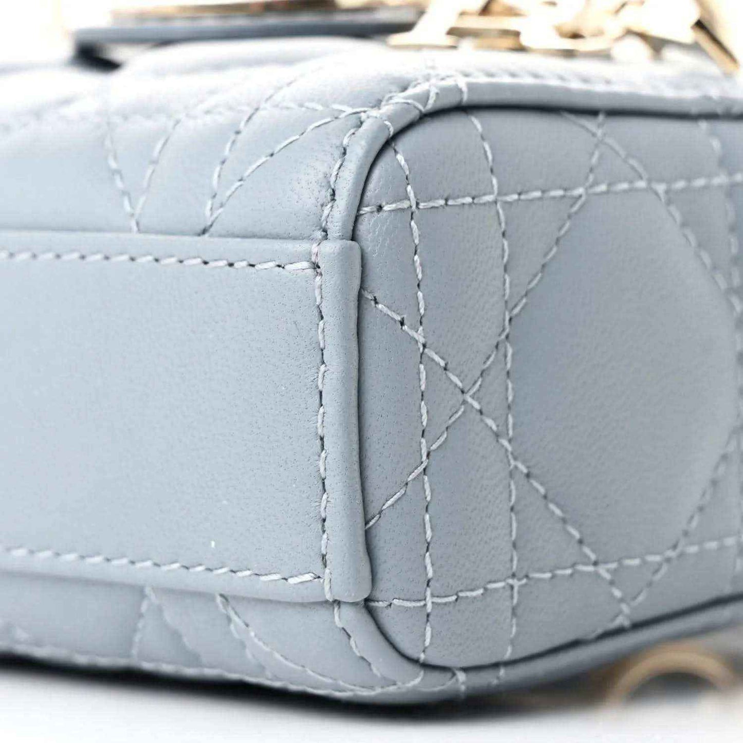 Micro Lady D-Joy bag corner in light blue lambskin with cannage quilting and gold trim