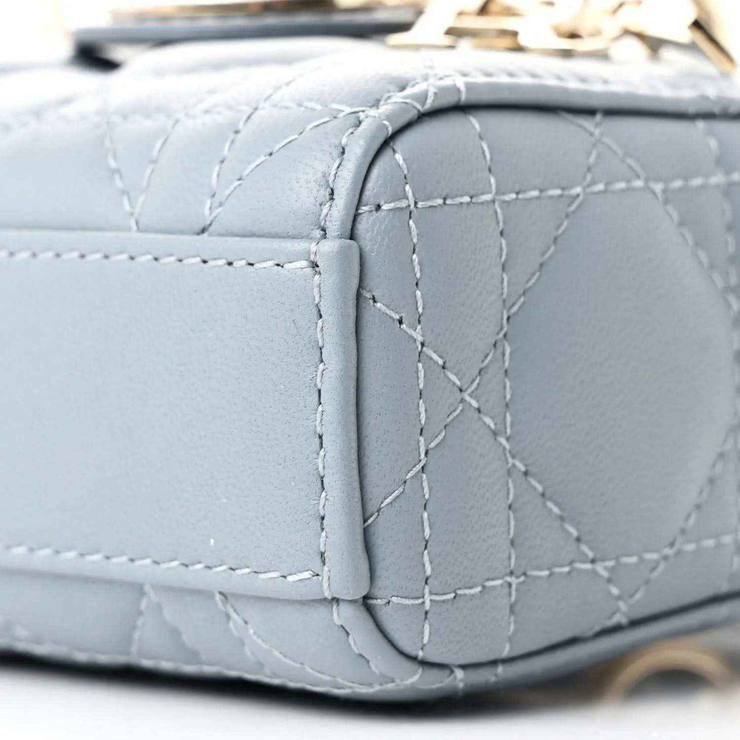 Micro Lady D-Joy bag corner in light blue lambskin with cannage quilting and gold trim