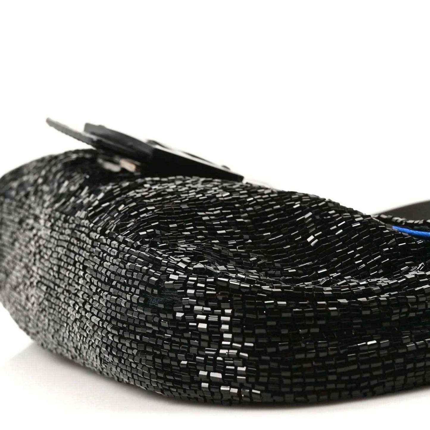 Black beaded baguette with raised flap and silver-toned clasp detail