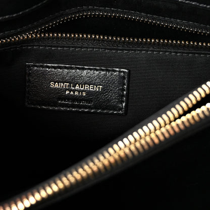 Black satchel with SAINT LAURENT PARIS leather interior label and zipper.