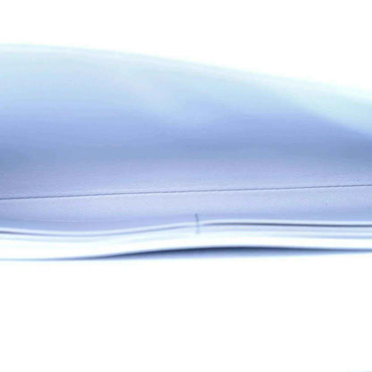 Light blue ostrich leather clutch bag corner detail with gold hardware