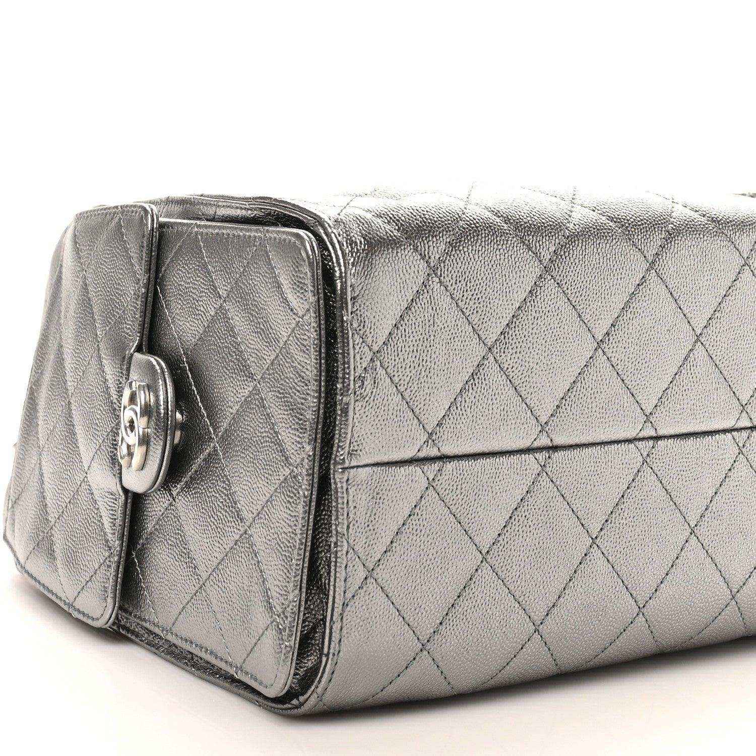 Chanel metallic quilted small handbag with side buckle detail and chain strap