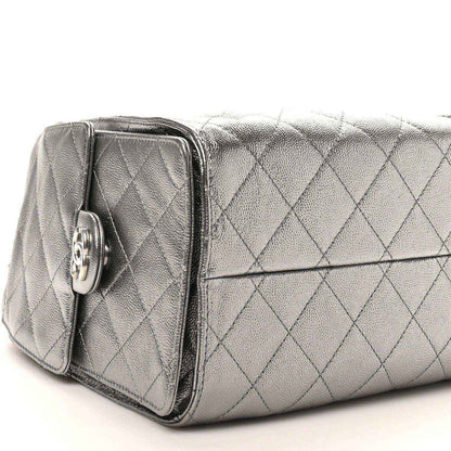 Chanel metallic quilted small handbag with side buckle detail and chain strap