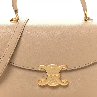 Beige Nino safari bag flap with gold C logo and leather strap