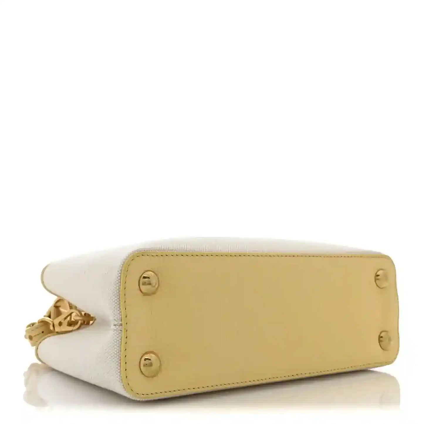 Louis Vuitton Capucines BB handbag base view with stitched leather panel and feet