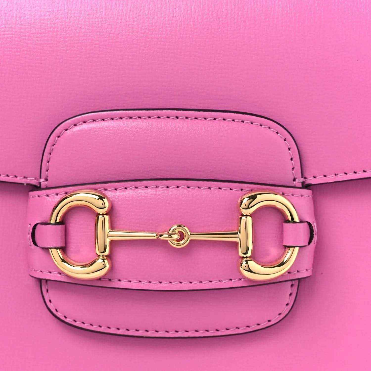 Gucci pink flap shoulder bag close-up of gold horsebit clasp and stitching