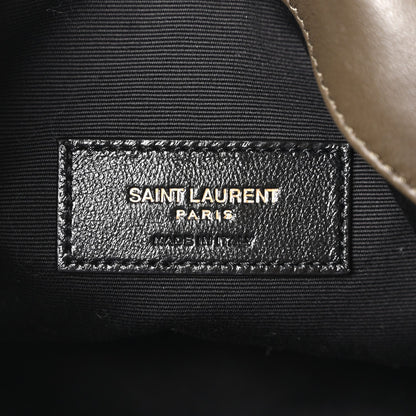 Saint Laurent Paris leather logo patch on inner pocket, close-up