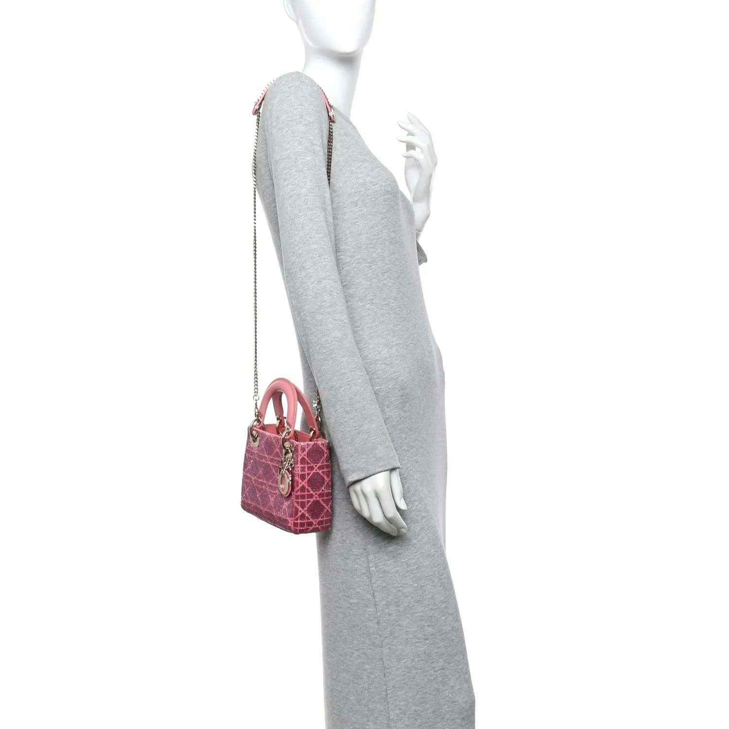 Mini Lady Dior handbag in light pink worn with short top handles and chain strap