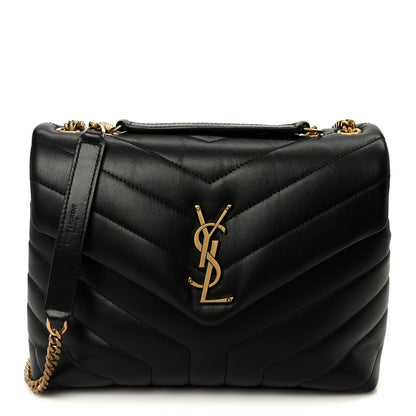 Black quilted leather chain satchel with YSL logo, top handle and shoulder strap.