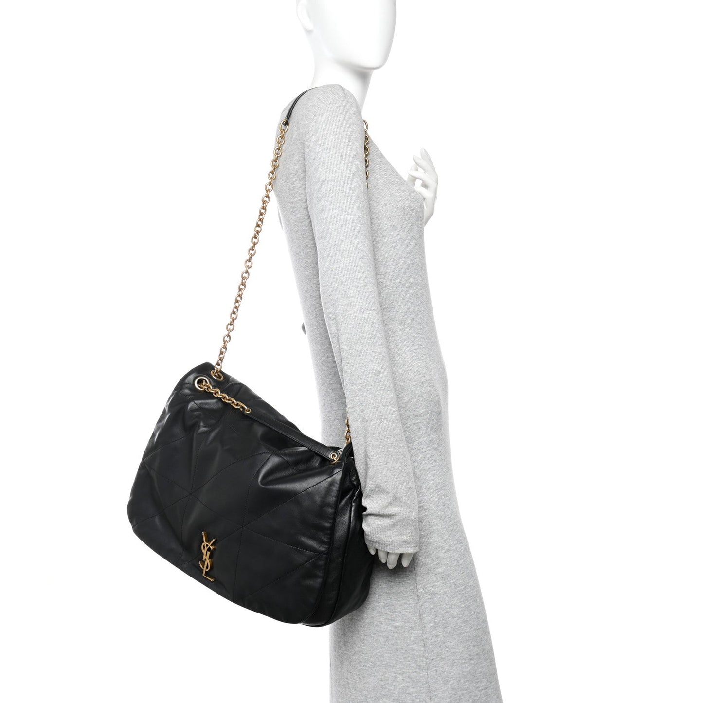 Black quilted lambskin shoulder bag on mannequin with gold chain strap and YSL monogram