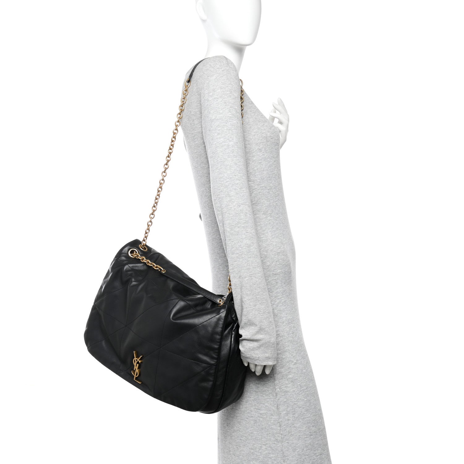 Black quilted lambskin shoulder bag on mannequin with gold chain strap and YSL monogram