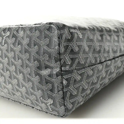 Grey canvas hobo bag with monogram pattern and stitched seams