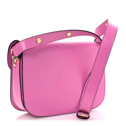 Gucci pink calfskin shoulder bag, gold studs on strap, side view with flap
