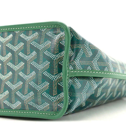 Reversible mini tote bag corner with green patterned fabric and contrast piping