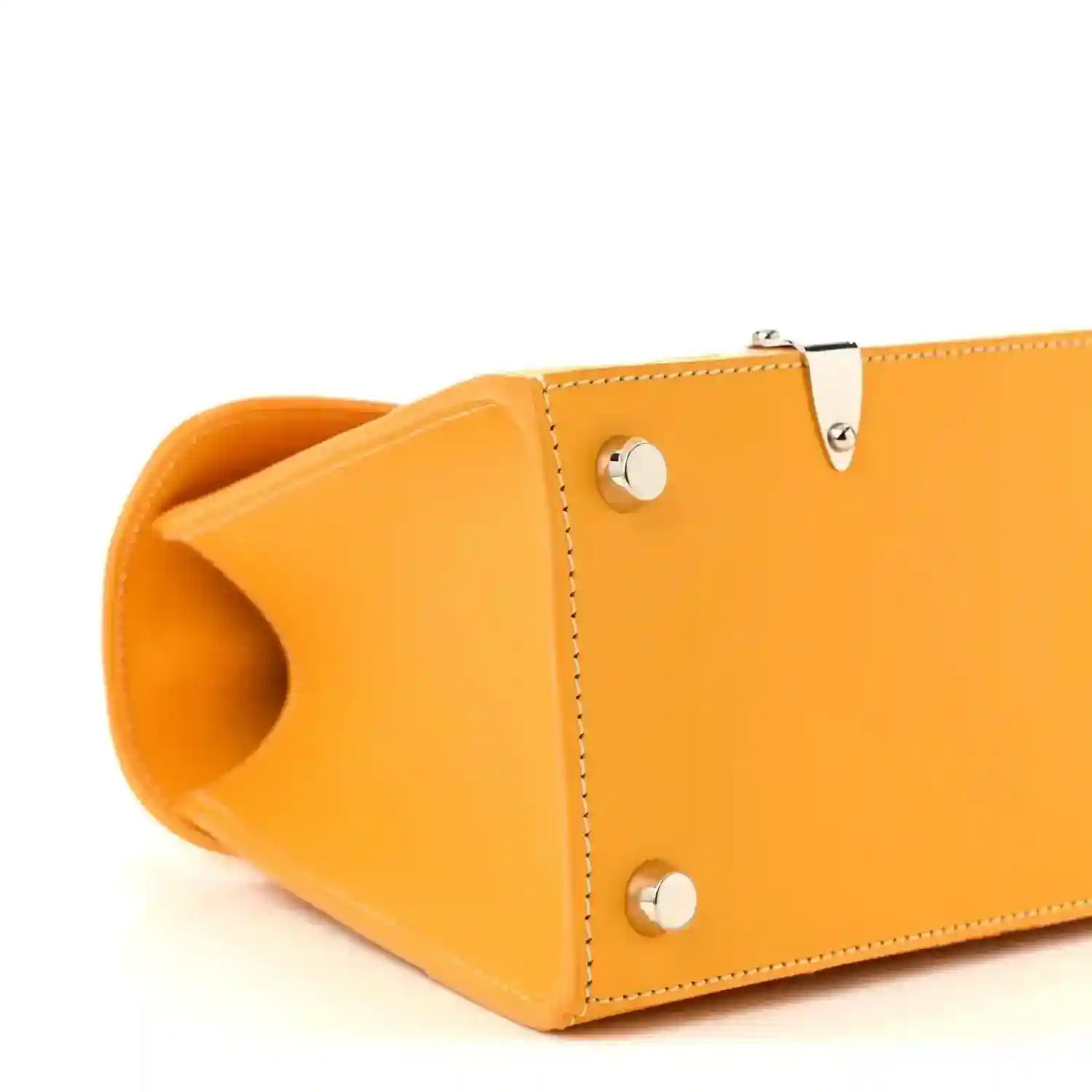 Yellow canvas handbag base with open side pocket and silver snap buttons.