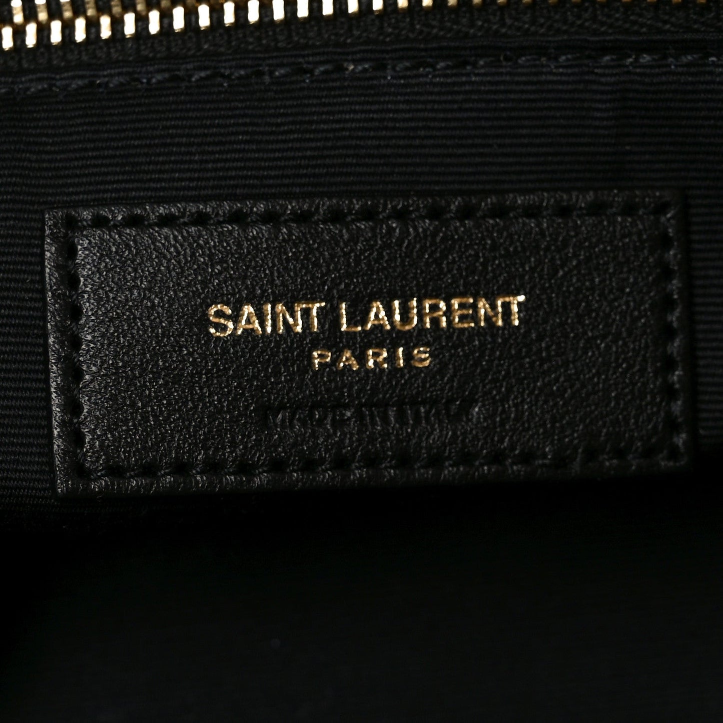 Saint Laurent Calypso bag label, black interior tag with Saint Laurent Paris