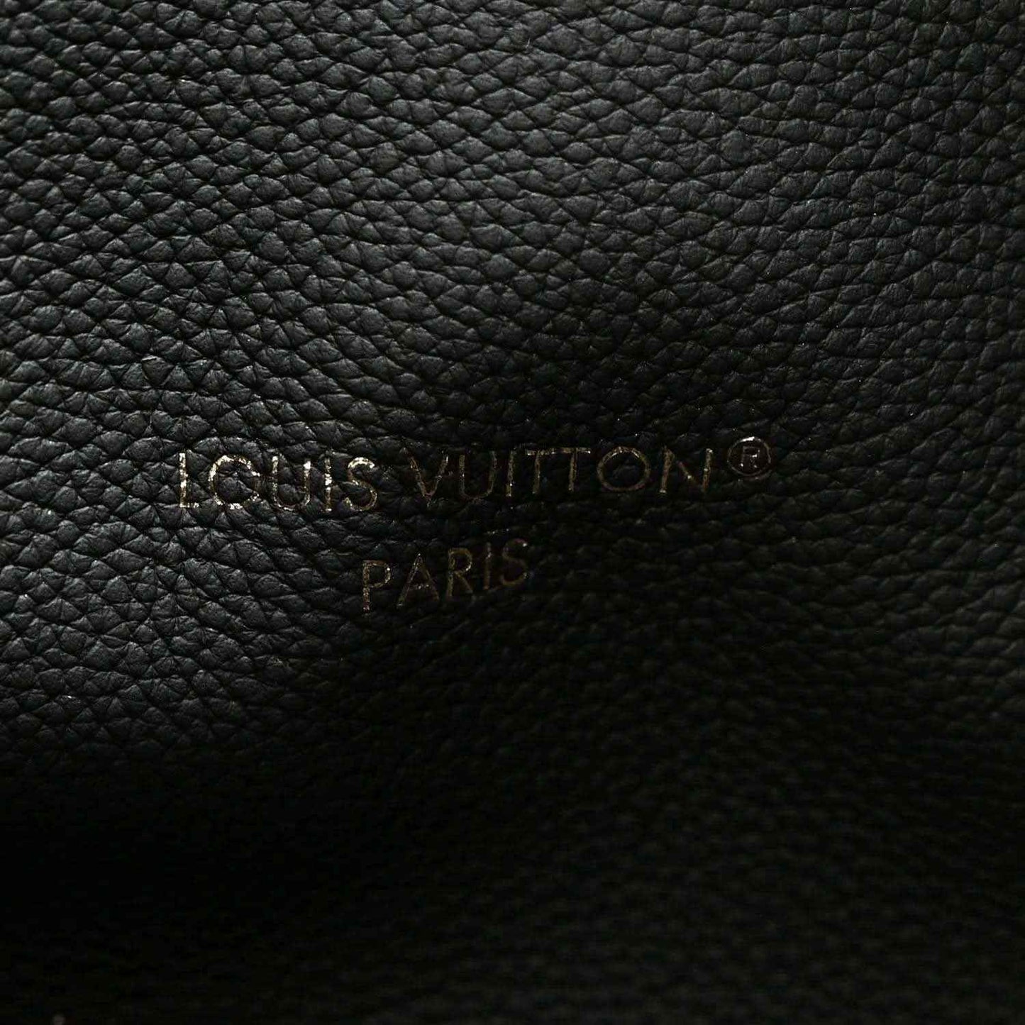 Louis Vuitton embossed logo on black leather lining