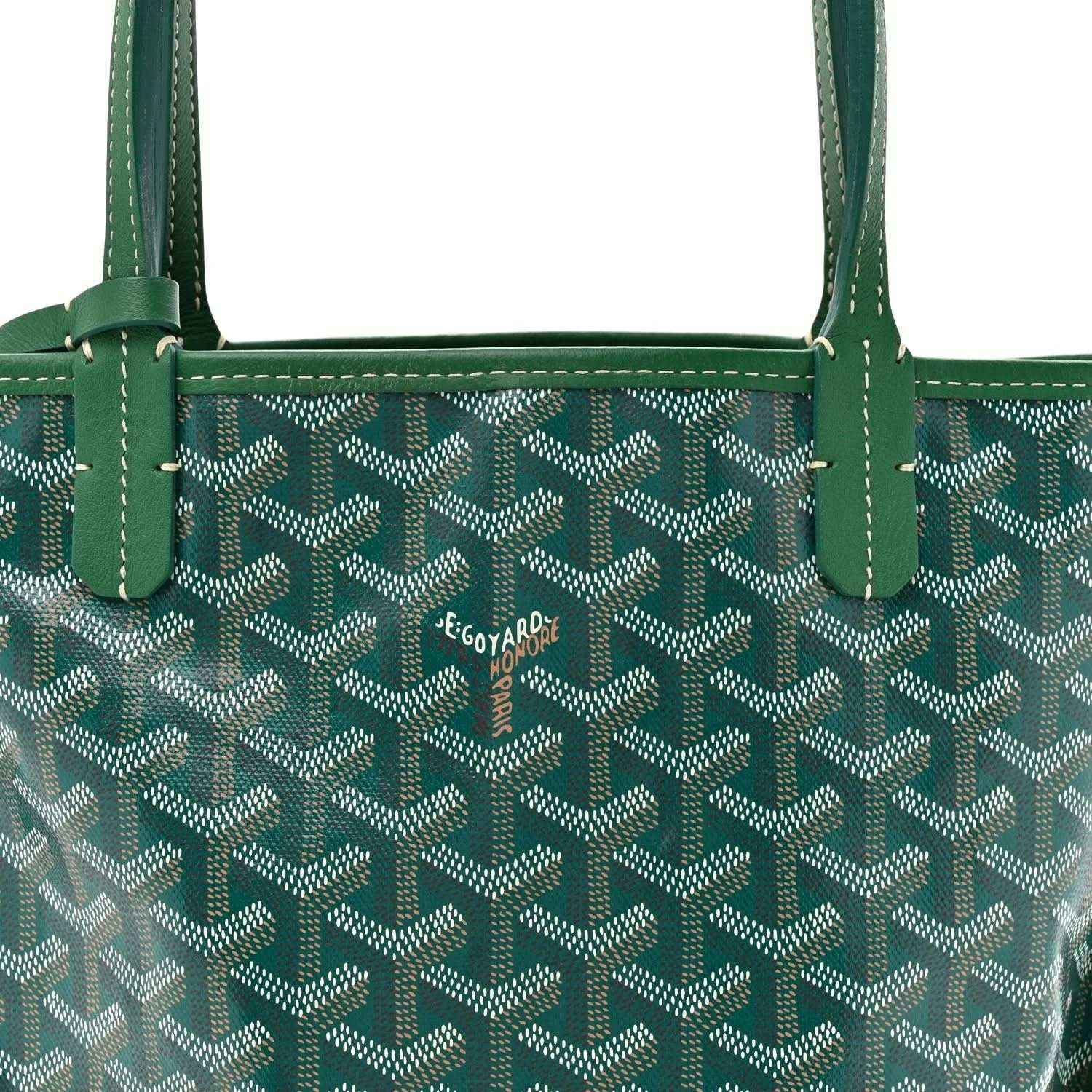Green reversible tote bag with patterned canvas front and top handles