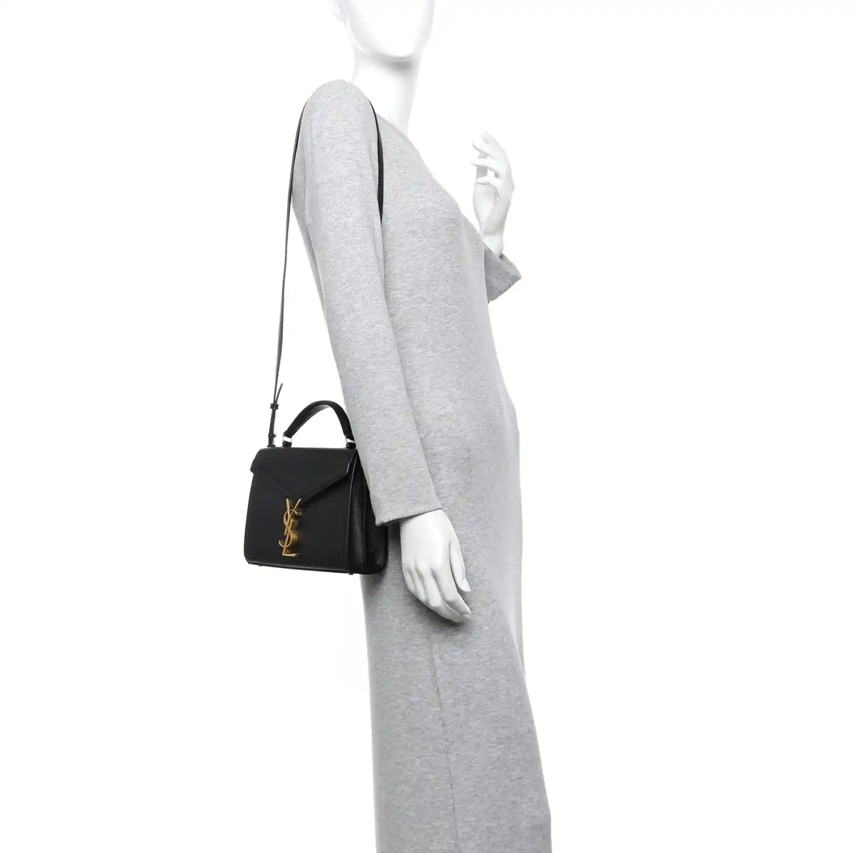 Black mini top-handle bag with gold YSL monogram and textured finish
