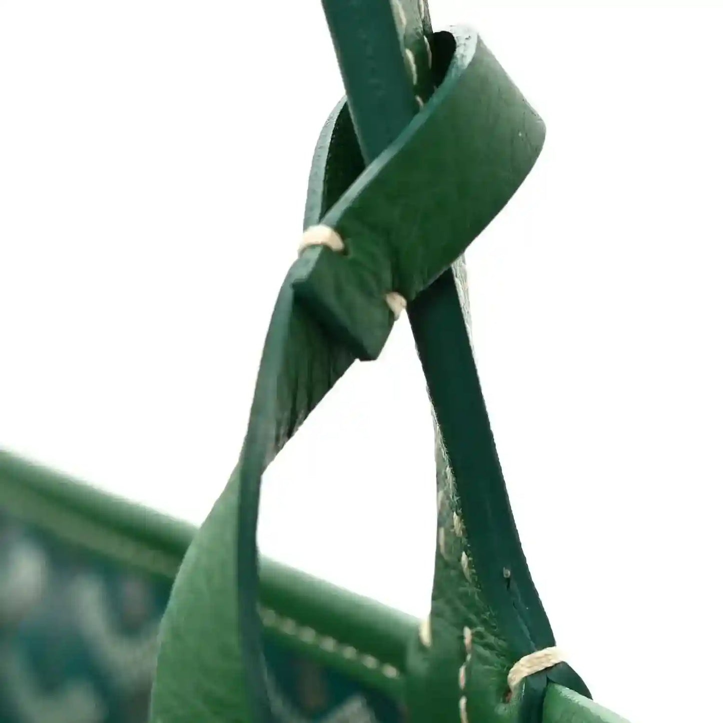 Reversible mini tote bag handle close-up in green with stitched connection