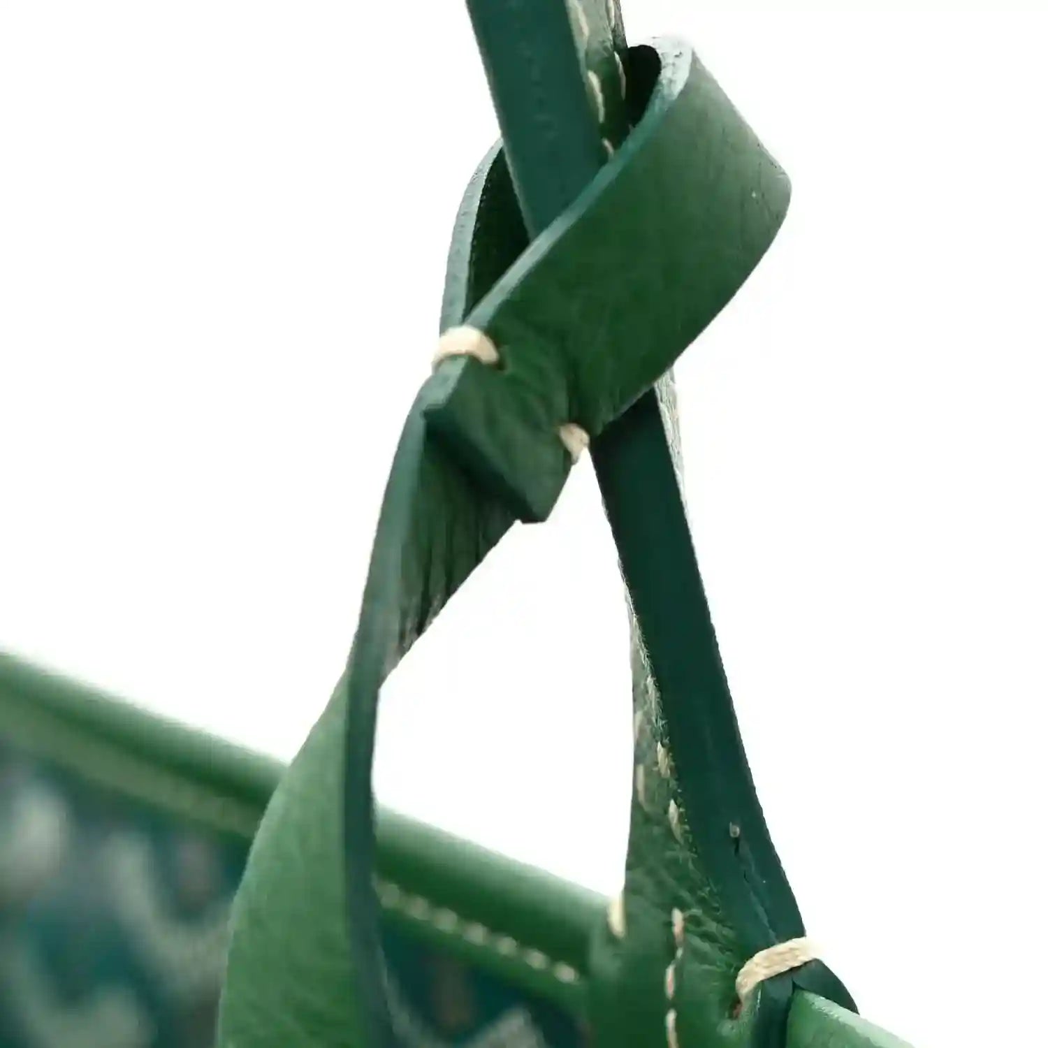 Reversible mini tote bag handle close-up in green with stitched connection