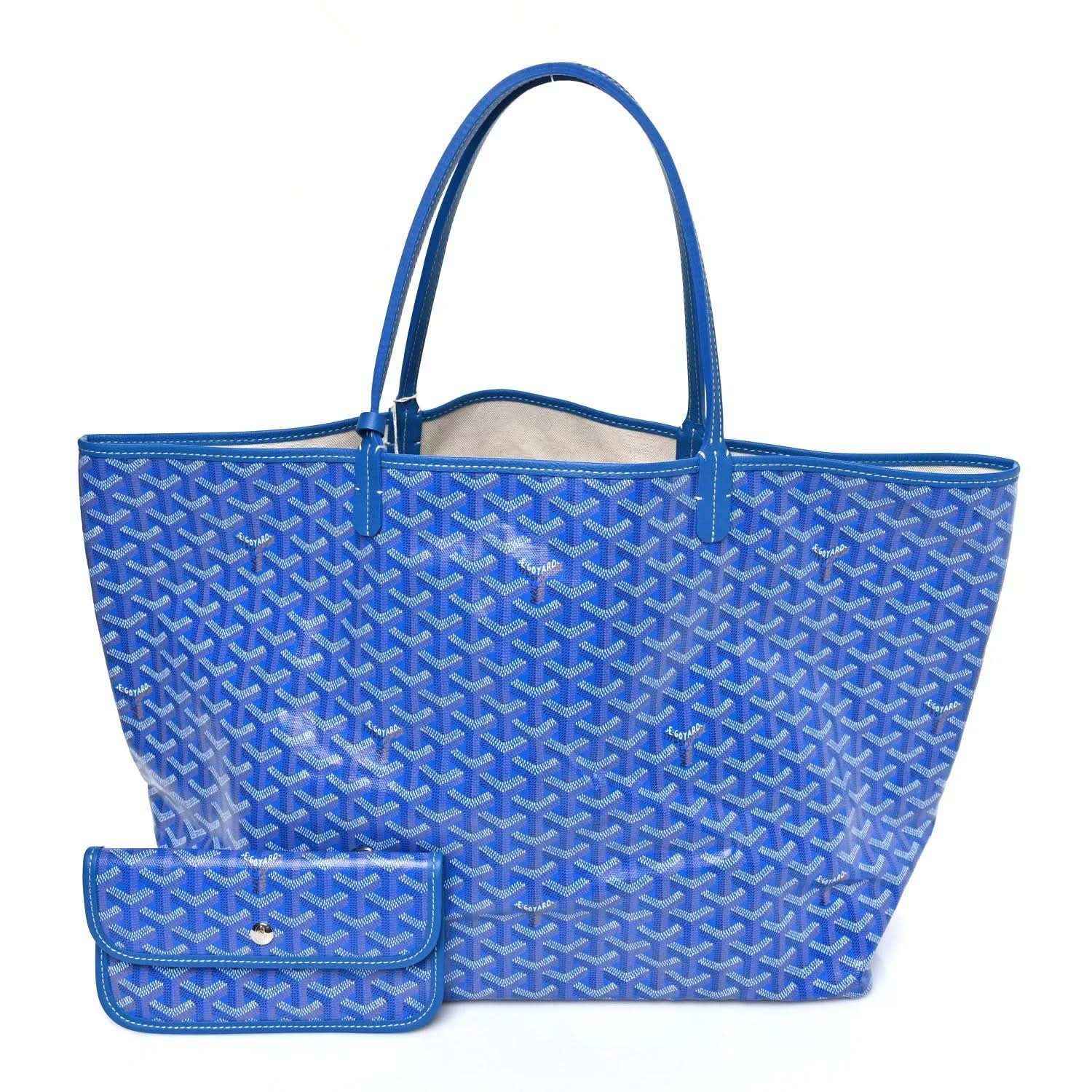 Sky blue Goyardine GM tote bag with matching small pouch and blue leather handles.