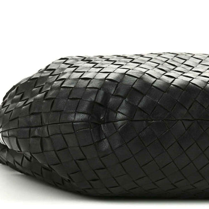 Black woven leather shoulder bag side with Intrecciato texture and seam