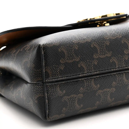 Celine Triomphe shoulder bag back corner close-up with gold hardware and dark canvas texture