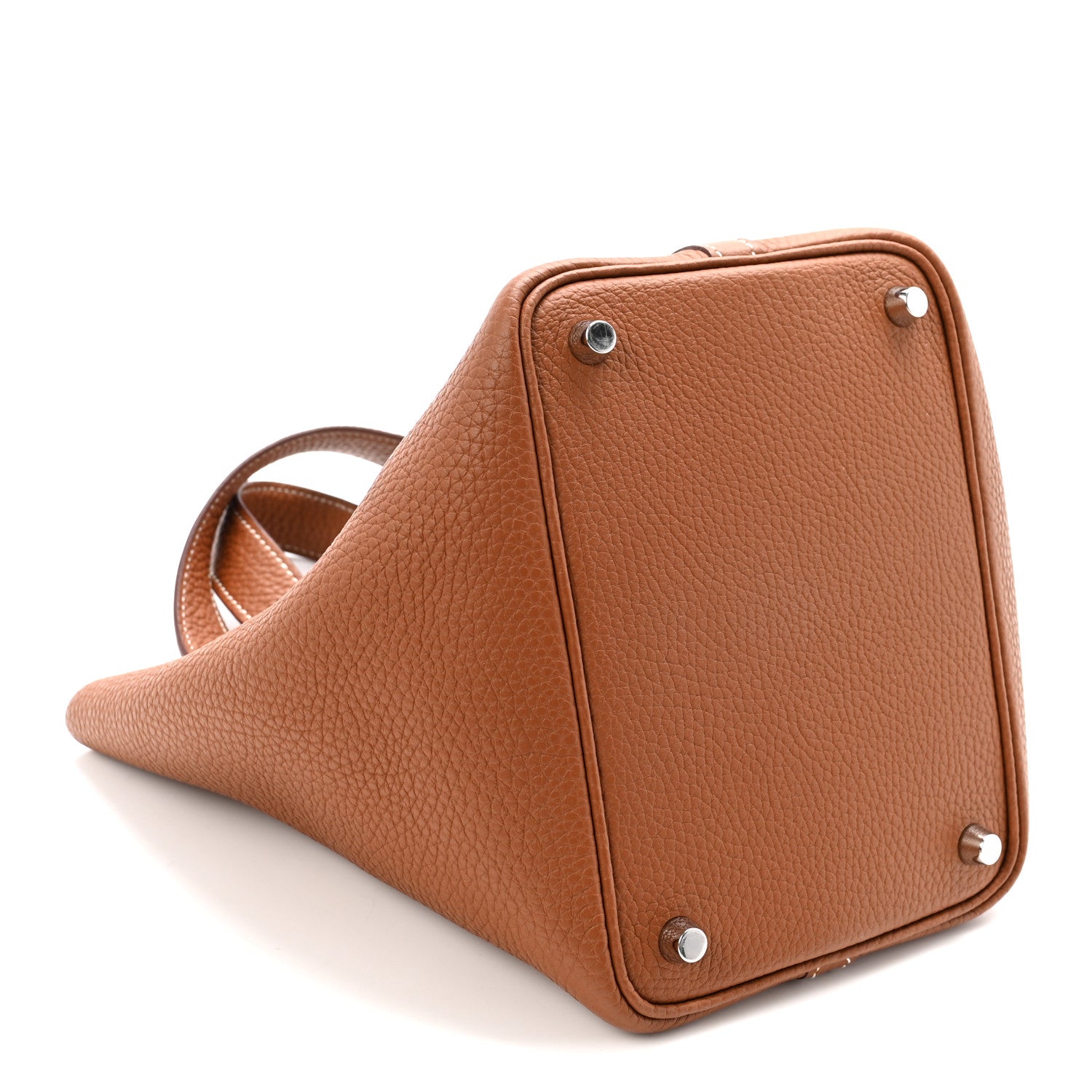 Cognac brown leather tote bag with metal feet and corner studs