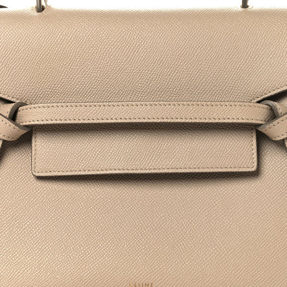 Celine light taupe micro belt bag front flap detail with adjustable belt strap