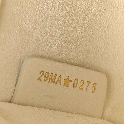 White leather handbag stamp with code 2NMA*0275