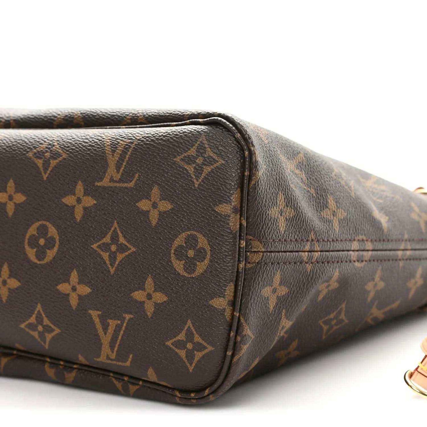 Louis Vuitton monogram canvas tote end corner close-up with leather edge stitching