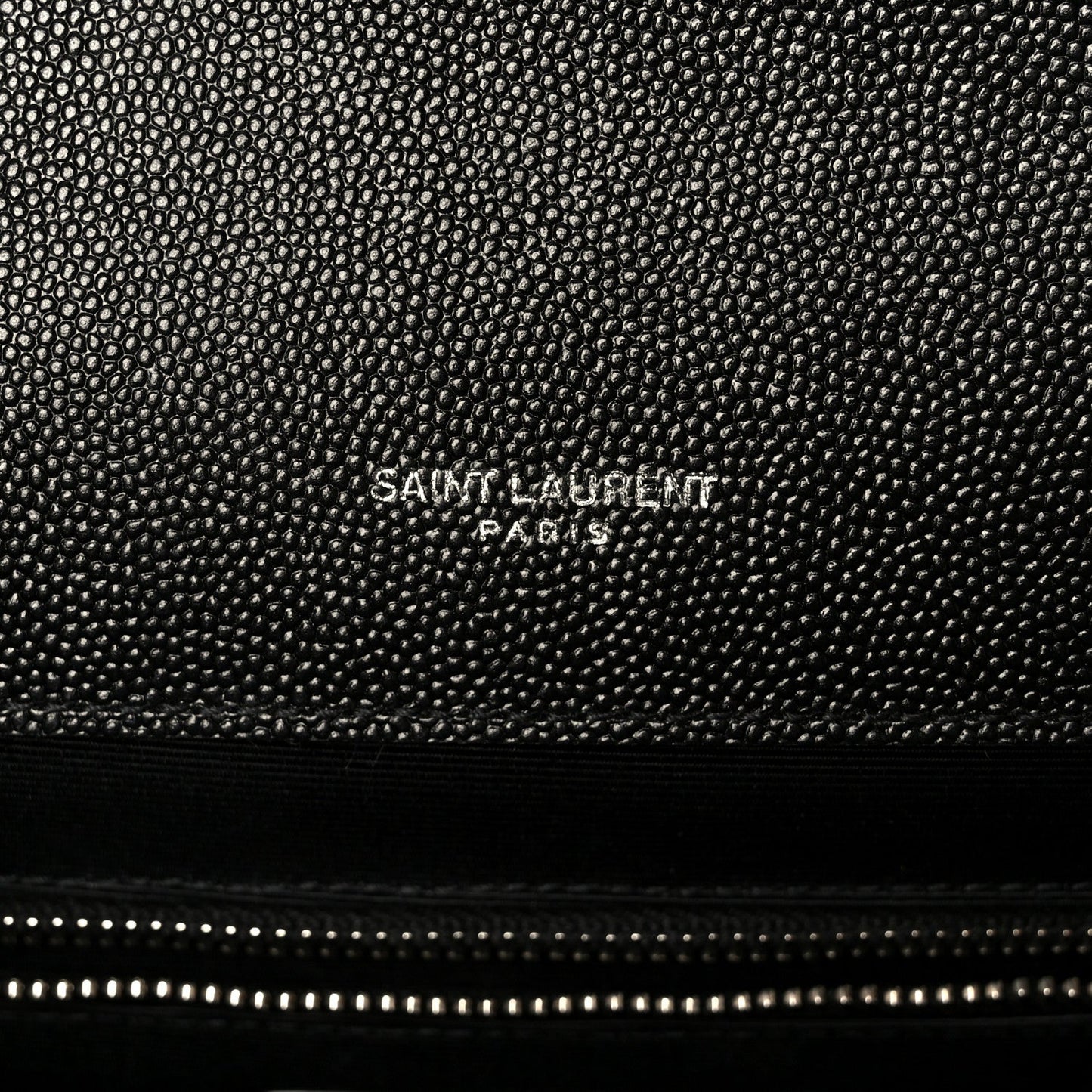 Black grain leather satchel with SAINT LAURENT PARIS embossed on textured surface